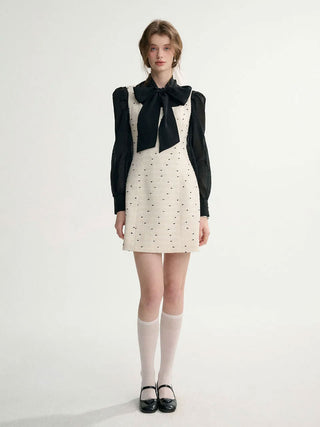 Ardor Tweed Mini Dress in Ivory with a tailored fit and luxurious tweed fabric, perfect for a sleek and elegant look.