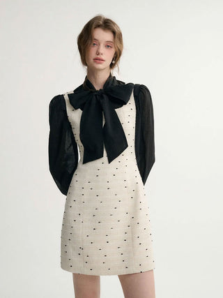 Ardor Tweed Mini Dress in Ivory with a tailored fit and luxurious tweed fabric, perfect for a sleek and elegant look.