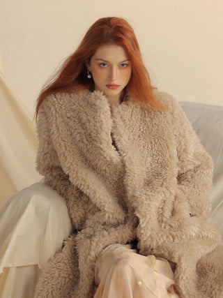 Model styled in the Cookie Boucle Long Coat, ideal for warm and chic winter looks – Sincethen