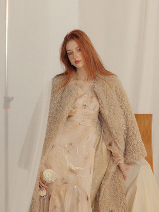 Model styled in the Cookie Boucle Long Coat, ideal for warm and chic winter looks – Sincethen