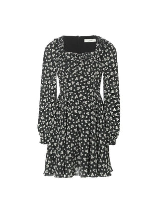 Dot Flori Mini Dress with polka dot pattern, perfect for a feminine and vintage-inspired look.