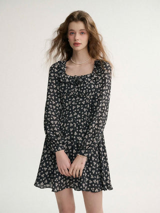 Dot Flori Mini Dress with polka dot pattern, perfect for a feminine and vintage-inspired look.