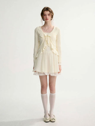 Elf Ruffle Knit Cardigan with delicate ruffle details, perfect for a feminine and romantic look.