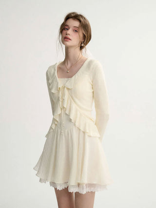 Elf Ruffle Knit Cardigan with delicate ruffle details, perfect for a feminine and romantic look.