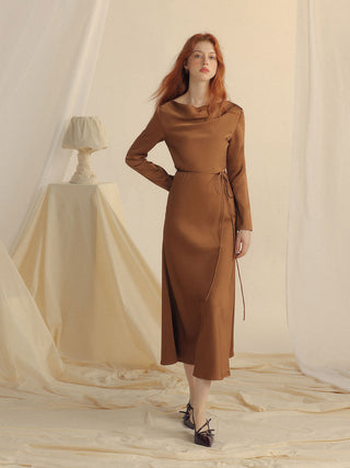 Model styled in the Glow Boat Neck Long Dress Brown, showcasing its timeless elegance – Sincethen