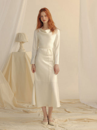 Model showcasing the Glow Boat Neck Long Dress Ivory, ideal for formal events – Sincethen